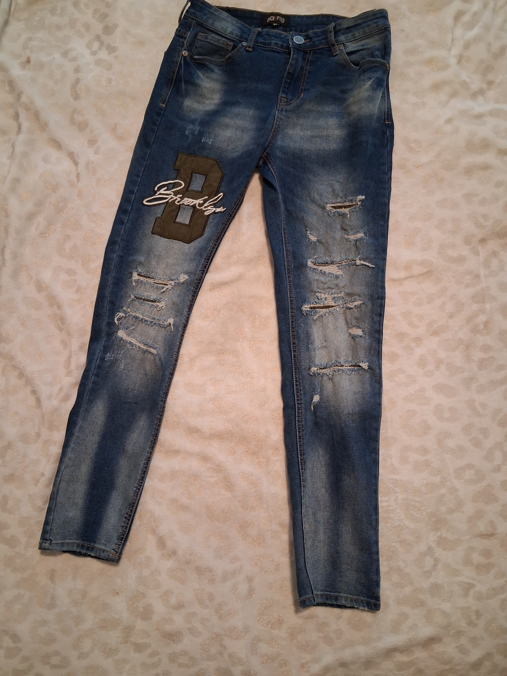 American Eagle Outfitters Slim Distressed Blue Jeans with Patch